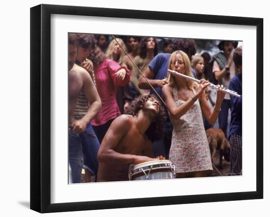 Shirtless Male Drummer and Dress Wearing Female Flutist Jamming During Woodstock Music Festival-Bill Eppridge-Framed Photographic Print