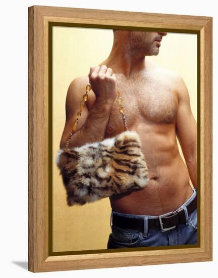 Shirtless Man Carrying an Animal Print Purse-Steve Cicero-Framed Premier Image Canvas