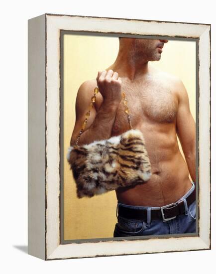 Shirtless Man Carrying an Animal Print Purse-Steve Cicero-Framed Premier Image Canvas