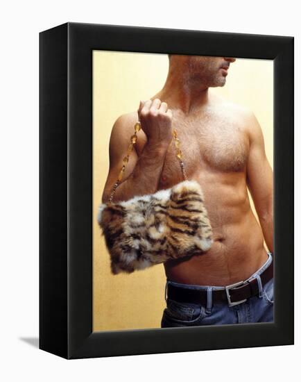 Shirtless Man Carrying an Animal Print Purse-Steve Cicero-Framed Premier Image Canvas