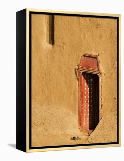 Shoes outside side door into the Mosque at Djenne, Mali, West Africa-Janis Miglavs-Framed Premier Image Canvas