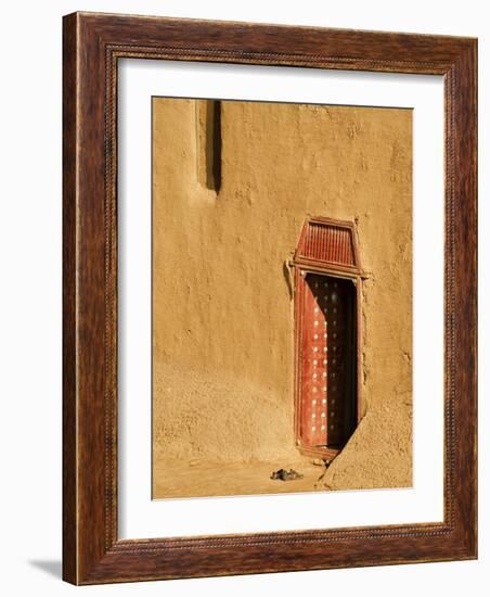 Shoes outside side door into the Mosque at Djenne, Mali, West Africa-Janis Miglavs-Framed Photographic Print