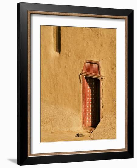 Shoes outside side door into the Mosque at Djenne, Mali, West Africa-Janis Miglavs-Framed Photographic Print