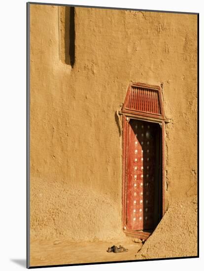 Shoes outside side door into the Mosque at Djenne, Mali, West Africa-Janis Miglavs-Mounted Photographic Print