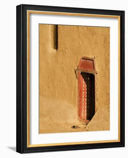 Shoes outside side door into the Mosque at Djenne, Mali, West Africa-Janis Miglavs-Framed Photographic Print