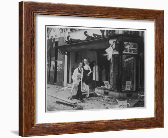 Shop Owner Poses with Two Mannequins Following the Destruction of His Shop by German Bombers-null-Framed Photographic Print