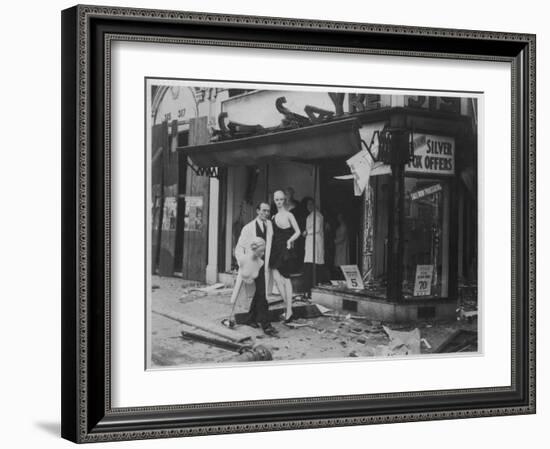 Shop Owner Poses with Two Mannequins Following the Destruction of His Shop by German Bombers-null-Framed Photographic Print