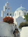 Figure on Donkey Passing Church Bell Tower and Dome, Vothonas, Santorini, Cyclades Islands, Greece-Short Michael-Photographic Print