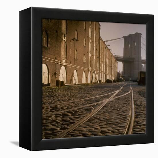 Shuttered Warehouses Lit by Sunlight on Trolley Track Railed Street Along Brooklyn Waterfront-Walker Evans-Framed Premier Image Canvas