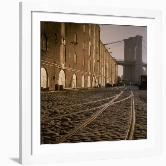 Shuttered Warehouses Lit by Sunlight on Trolley Track Railed Street Along Brooklyn Waterfront-Walker Evans-Framed Premium Photographic Print