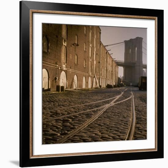 Shuttered Warehouses Lit by Sunlight on Trolley Track Railed Street Along Brooklyn Waterfront-Walker Evans-Framed Premium Photographic Print