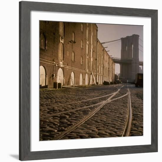 Shuttered Warehouses Lit by Sunlight on Trolley Track Railed Street Along Brooklyn Waterfront-Walker Evans-Framed Premium Photographic Print