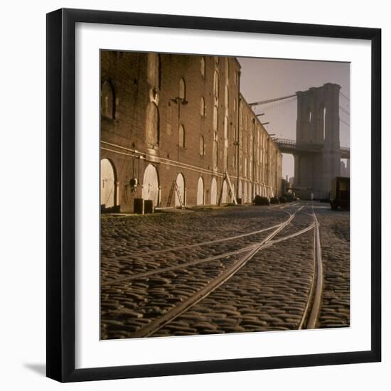 Shuttered Warehouses Lit by Sunlight on Trolley Track Railed Street Along Brooklyn Waterfront-Walker Evans-Framed Photographic Print