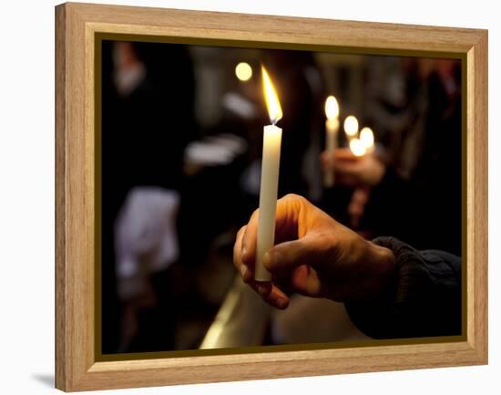 Sicily, Italy, Western Europe, a Believer, Holding a Candle During the Easter Eve Ceremony at the T-Ken Scicluna-Framed Premier Image Canvas