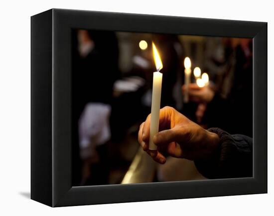 Sicily, Italy, Western Europe, a Believer, Holding a Candle During the Easter Eve Ceremony at the T-Ken Scicluna-Framed Premier Image Canvas