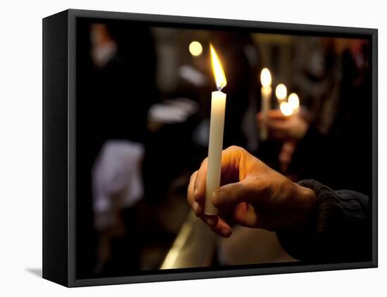 Sicily, Italy, Western Europe, a Believer, Holding a Candle During the Easter Eve Ceremony at the T-Ken Scicluna-Framed Premier Image Canvas