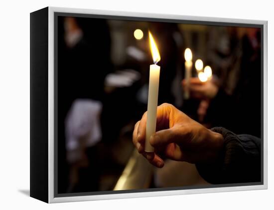 Sicily, Italy, Western Europe, a Believer, Holding a Candle During the Easter Eve Ceremony at the T-Ken Scicluna-Framed Premier Image Canvas