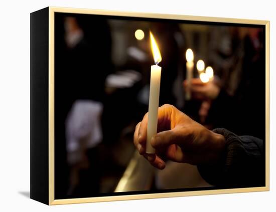 Sicily, Italy, Western Europe, a Believer, Holding a Candle During the Easter Eve Ceremony at the T-Ken Scicluna-Framed Premier Image Canvas