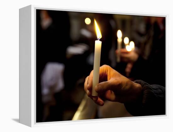 Sicily, Italy, Western Europe, a Believer, Holding a Candle During the Easter Eve Ceremony at the T-Ken Scicluna-Framed Premier Image Canvas