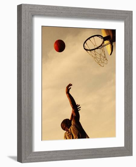 Side Profile of a Mid Adult Man Playing Basketball-null-Framed Photographic Print