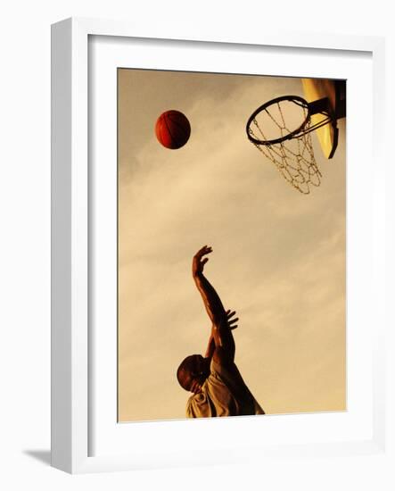 Side Profile of a Mid Adult Man Playing Basketball-null-Framed Photographic Print