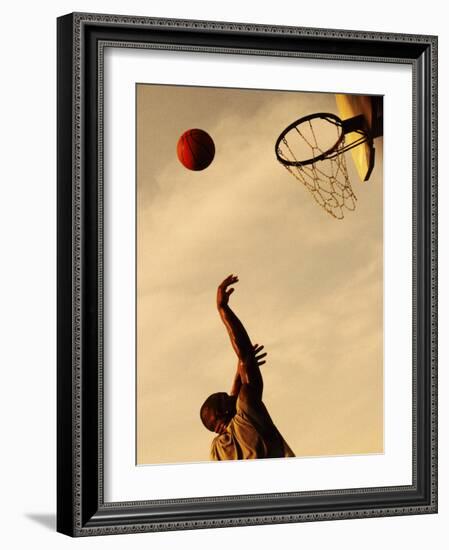 Side Profile of a Mid Adult Man Playing Basketball-null-Framed Photographic Print