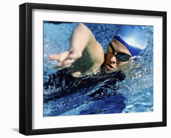 Side Profile of a Mid Adult Woman Swimming in a Swimming Pool-null-Framed Photographic Print