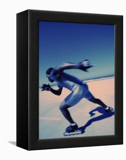 Side Profile of a Young Man Inline Skating-null-Framed Premier Image Canvas