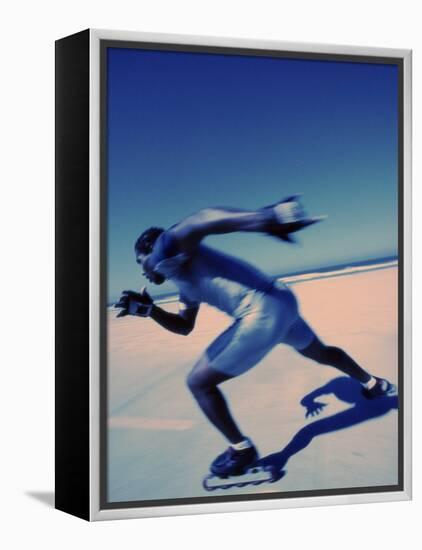 Side Profile of a Young Man Inline Skating-null-Framed Premier Image Canvas