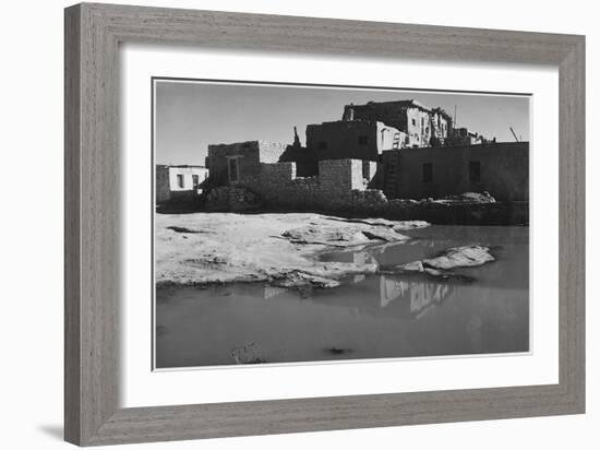 Side View Of Adobe House With Water In Foreground" Acoma Pueblo [NHL New Mexico]." 1933-1942-Ansel Adams-Framed Art Print