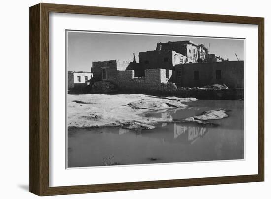 Side View Of Adobe House With Water In Foreground" Acoma Pueblo [NHL New Mexico]." 1933-1942-Ansel Adams-Framed Art Print