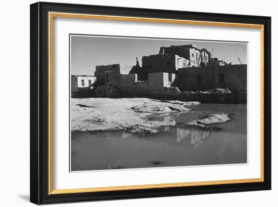 Side View Of Adobe House With Water In Foreground" Acoma Pueblo [NHL New Mexico]." 1933-1942-Ansel Adams-Framed Art Print