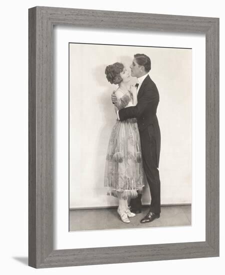 Side View of Romantic Couple Embracing-null-Framed Photo