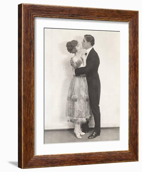 Side View of Romantic Couple Embracing-null-Framed Photo