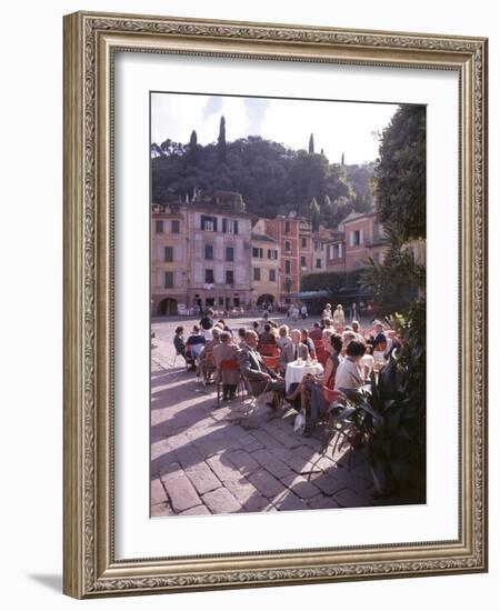 Sidewalk Cafe Sitters Taking in the Evening Sun at Portofino, Italy-Ralph Crane-Framed Photographic Print
