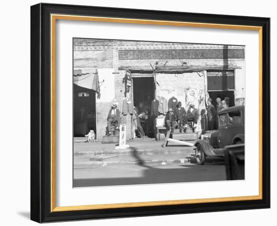 Sidewalk scene in Selma, Alabama, 1935-Walker Evans-Framed Photographic Print