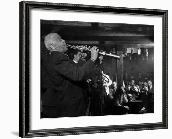 Sidney Bechet Performing in Small Basement Club "Vieux Colombier"-Nat Farbman-Framed Premium Photographic Print