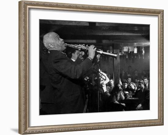 Sidney Bechet Performing in Small Basement Club "Vieux Colombier"-Nat Farbman-Framed Premium Photographic Print