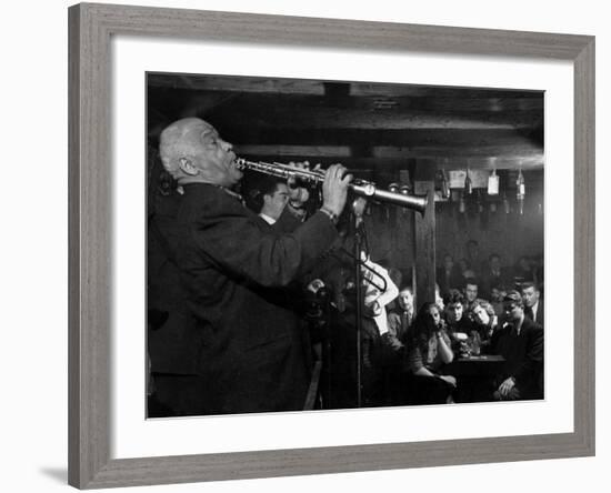 Sidney Bechet Performing in Small Basement Club "Vieux Colombier"-Nat Farbman-Framed Premium Photographic Print