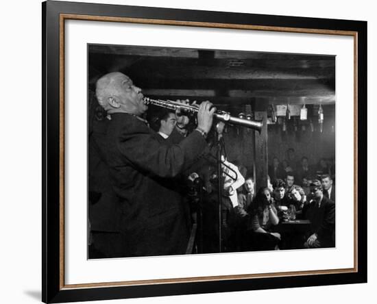 Sidney Bechet Performing in Small Basement Club "Vieux Colombier"-Nat Farbman-Framed Premium Photographic Print