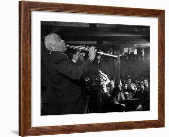 Sidney Bechet Performing in Small Basement Club "Vieux Colombier"-Nat Farbman-Framed Premium Photographic Print