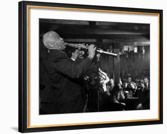 Sidney Bechet Performing in Small Basement Club "Vieux Colombier"-Nat Farbman-Framed Premium Photographic Print