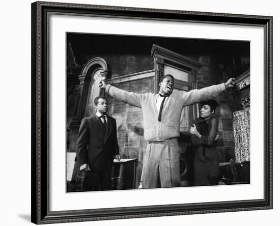 Sidney Poitier in Dramatic Scene from Play "A Raisin in the Sun", Actress Ruby Dee Visible on Right-Gordon Parks-Framed Premium Photographic Print