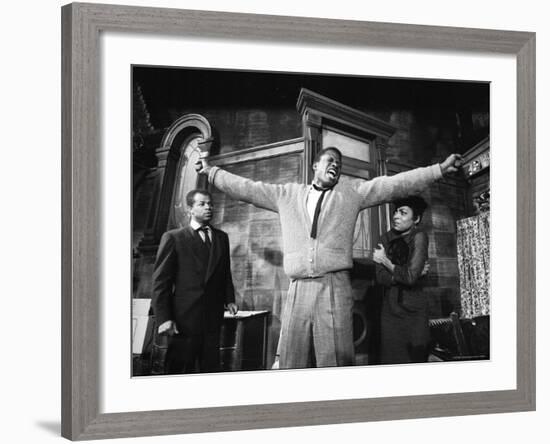 Sidney Poitier in Dramatic Scene from Play "A Raisin in the Sun", Actress Ruby Dee Visible on Right-Gordon Parks-Framed Premium Photographic Print