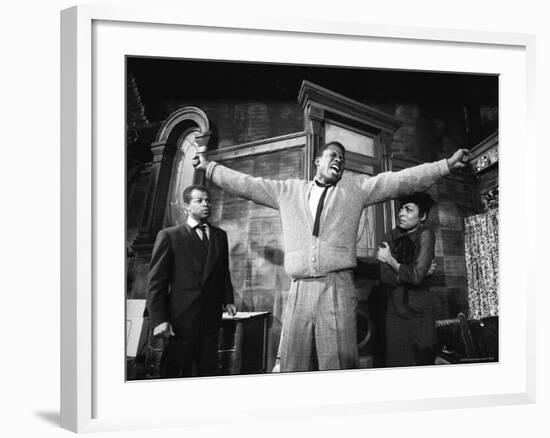 Sidney Poitier in Dramatic Scene from Play "A Raisin in the Sun", Actress Ruby Dee Visible on Right-Gordon Parks-Framed Premium Photographic Print