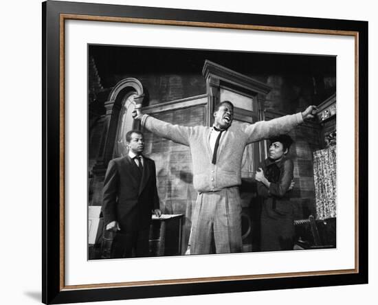 Sidney Poitier in Dramatic Scene from Play "A Raisin in the Sun", Actress Ruby Dee Visible on Right-Gordon Parks-Framed Premium Photographic Print