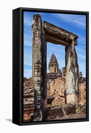 Siem Reap, Cambodia. Ancient doorway still standing through which the spires and statues atop of th-Miva Stock-Framed Premier Image Canvas