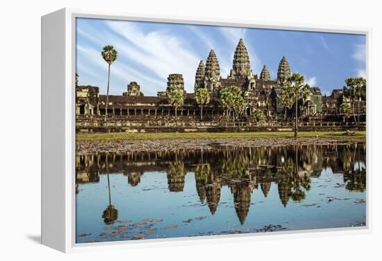 Siem Reap, Cambodia. Ancient ruins and towers of the Bayon Temple Angkor Wat-Miva Stock-Framed Premier Image Canvas