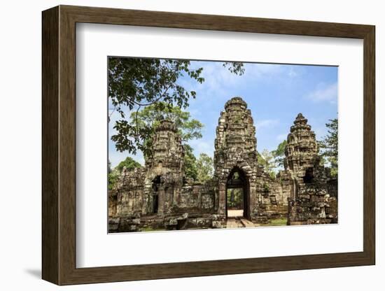 Siem Reap, Cambodia. Entrance to the ancient ruins and towers of the Bayon Temple in Preah Khan-Miva Stock-Framed Photographic Print