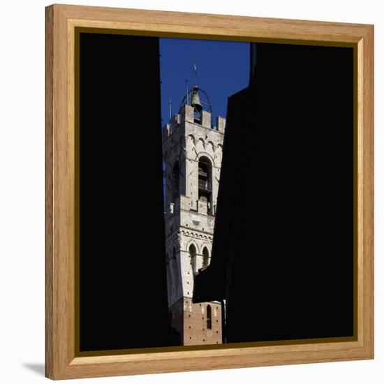 Siena Architectural Details. Glimpse of Crenellated Tower with Bell-Mike Burton-Framed Premier Image Canvas